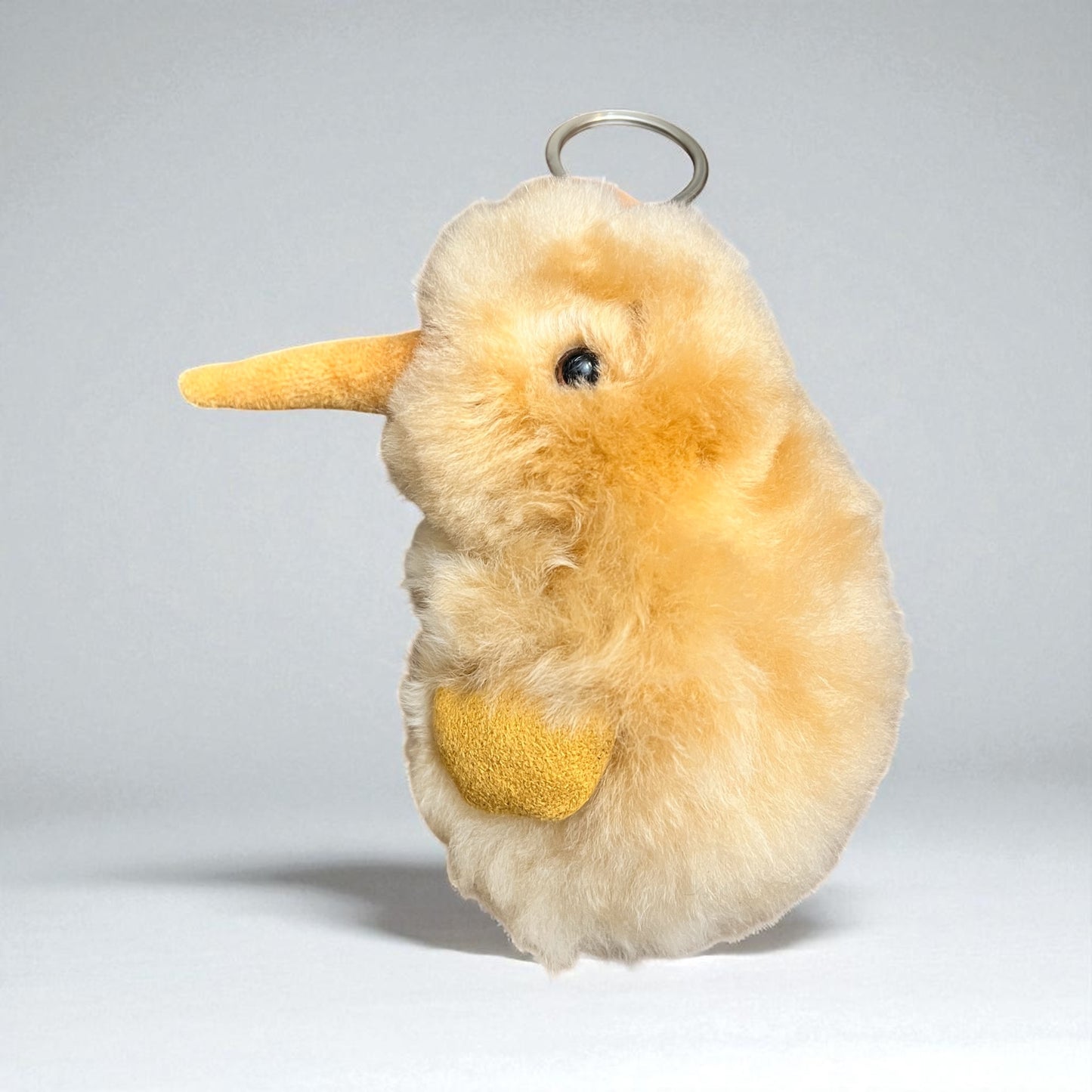 KIWI. ALPACA FUR ZIPPER CHARM