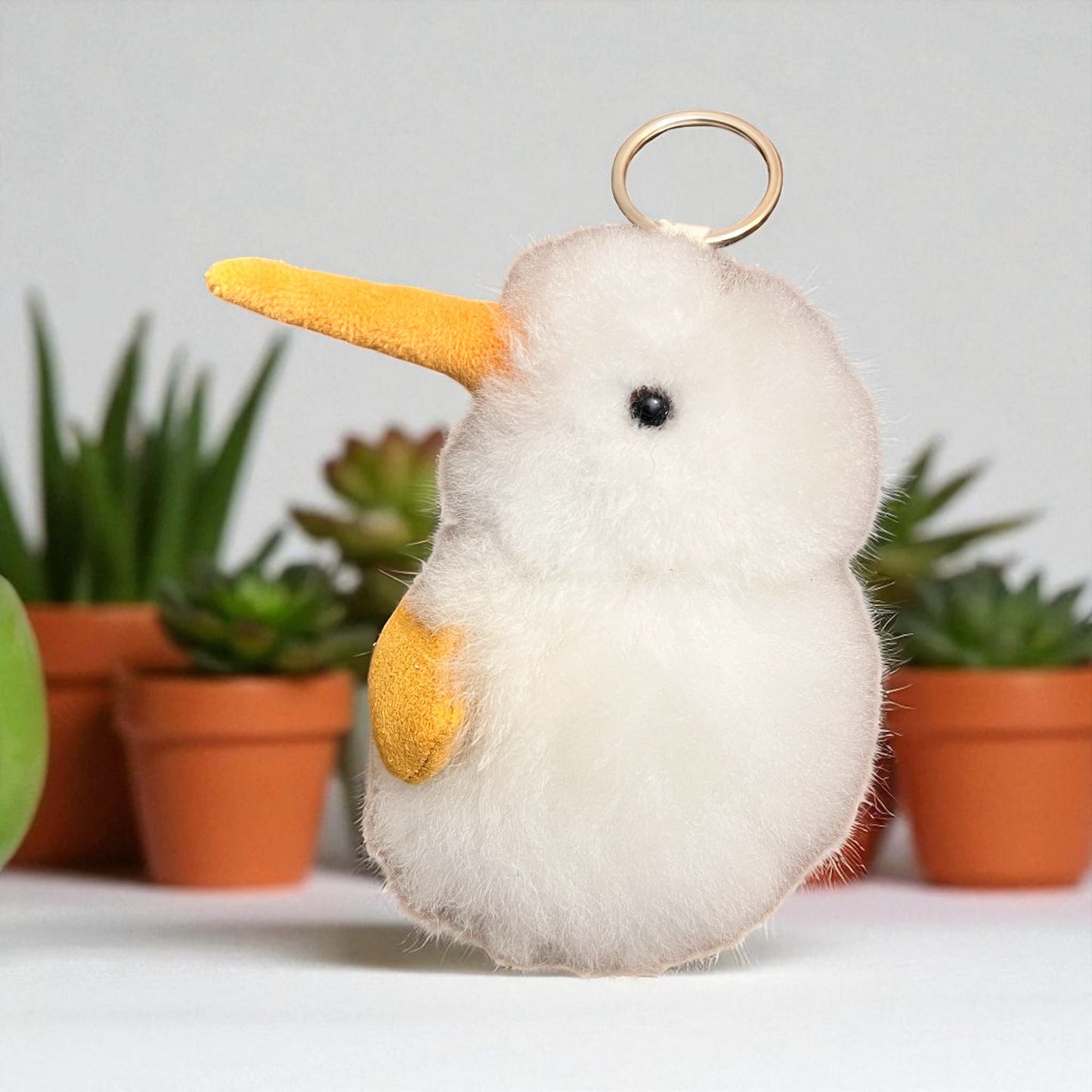 KIWI. ALPACA FUR ZIPPER CHARM