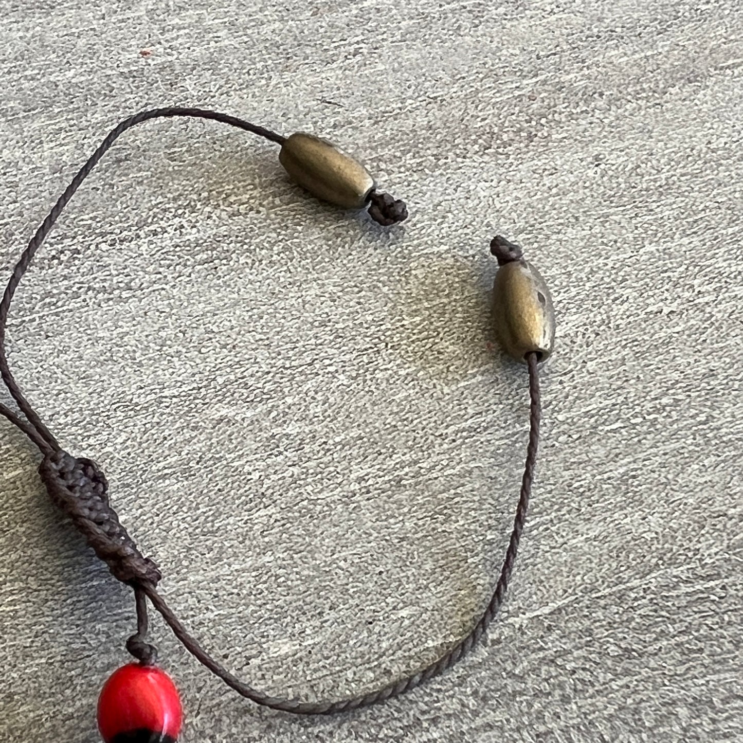 Peruvian Huayruro Seed Bracelet, for good luck.