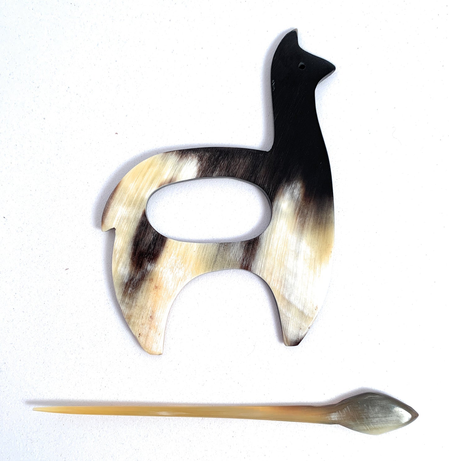 Handmade luxury sweater pins made from bull horns. - Peruvian Accent