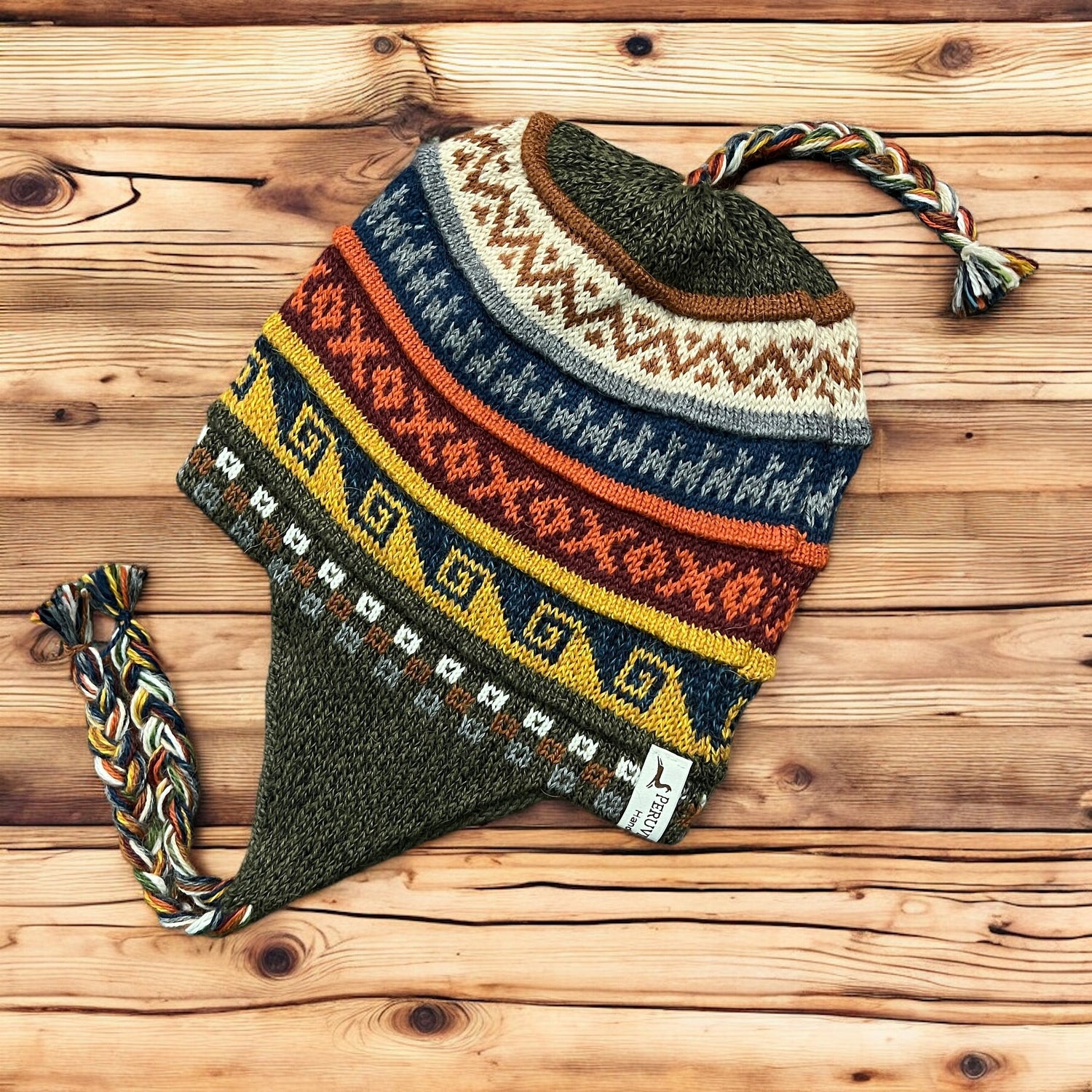 Military Green tweed, reversible, luxury alpaca chullo beanie. hypoallergenic, repels water, wicks moisture and regulates heat.  Super soft and so fun for snowboarding, skiing, hiking and travels.  Style #6. By Peruvian Accent