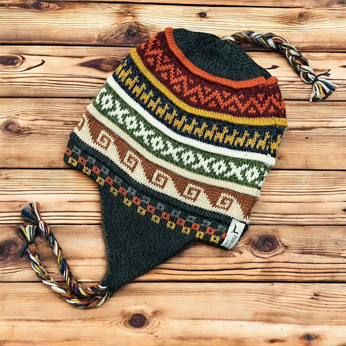 Dark Green tweed, reversible, luxury alpaca chullo beanie. hypoallergenic, repels water, wicks moisture and regulates heat.  Super soft and so fun for snowboarding, skiing, hiking and travels.  Style #7. By Peruvian Accent