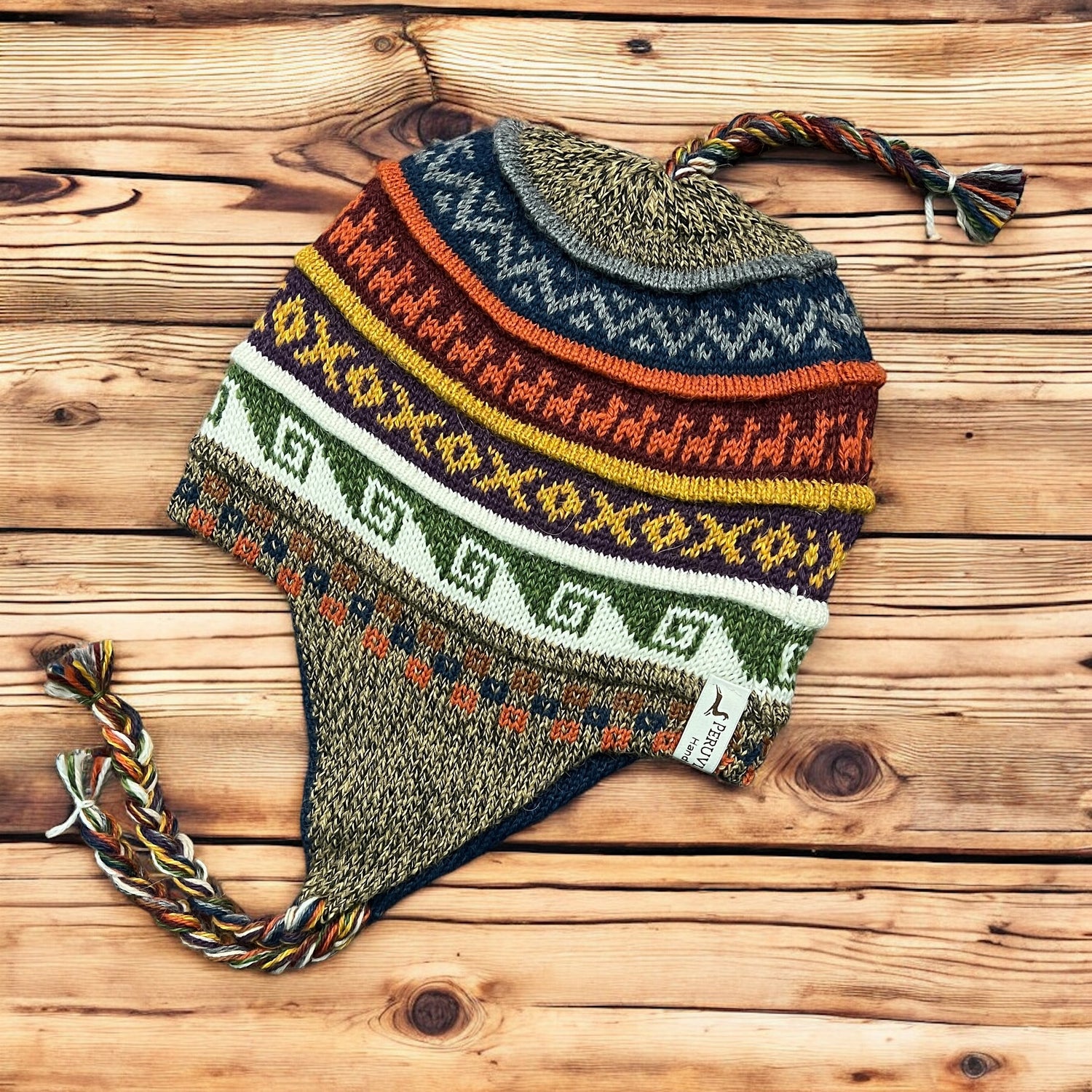 Sand tweed, reversible, luxury alpaca chullo beanie. hypoallergenic, repels water, wicks moisture and regulates heat.  Super soft and so fun for snowboarding, skiing, hiking and travels.  Style #8. By Peruvian Accent