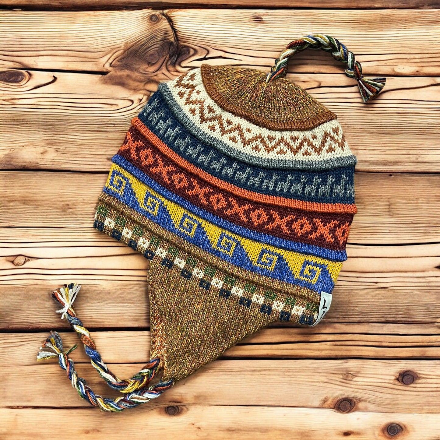 Fall tweed, reversible, luxury alpaca chullo beanie. hypoallergenic, repels water, wicks moisture and regulates heat.  Super soft and so fun for snowboarding, skiing, hiking and travels.  Style #9. By Peruvian Accent