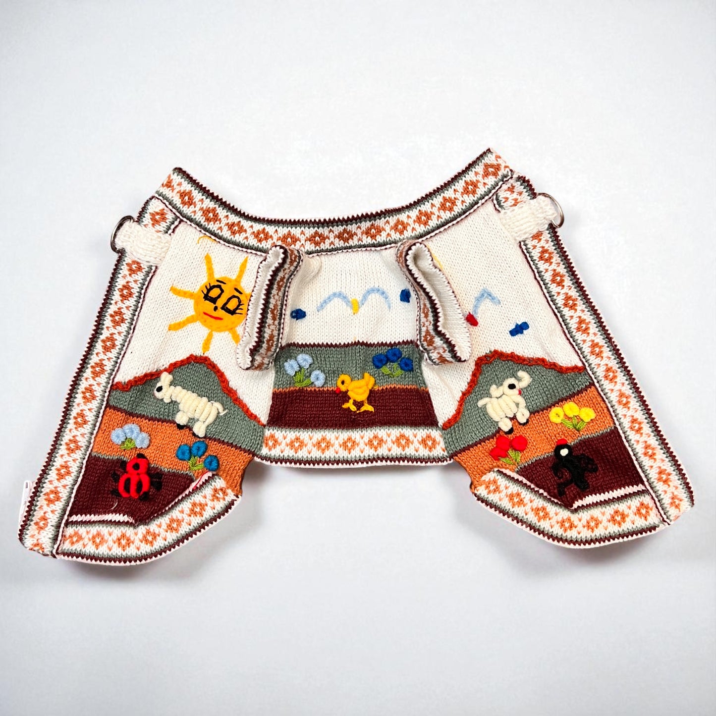 hand embroidered royal bone color dog sweater, handmade in the andes of Peru by Peruvian Accent.
