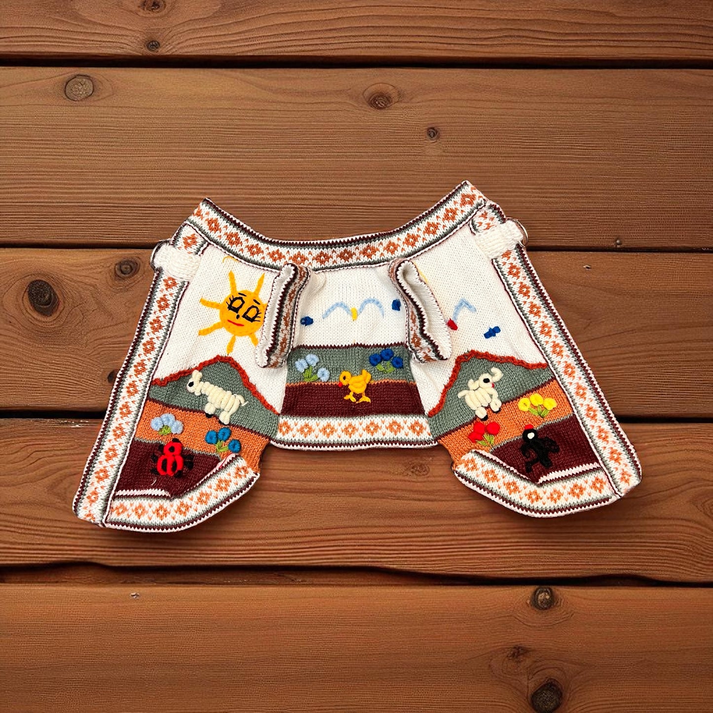 hand embroidered royal bone color dog sweater, handmade in the andes of Peru by Peruvian Accent.