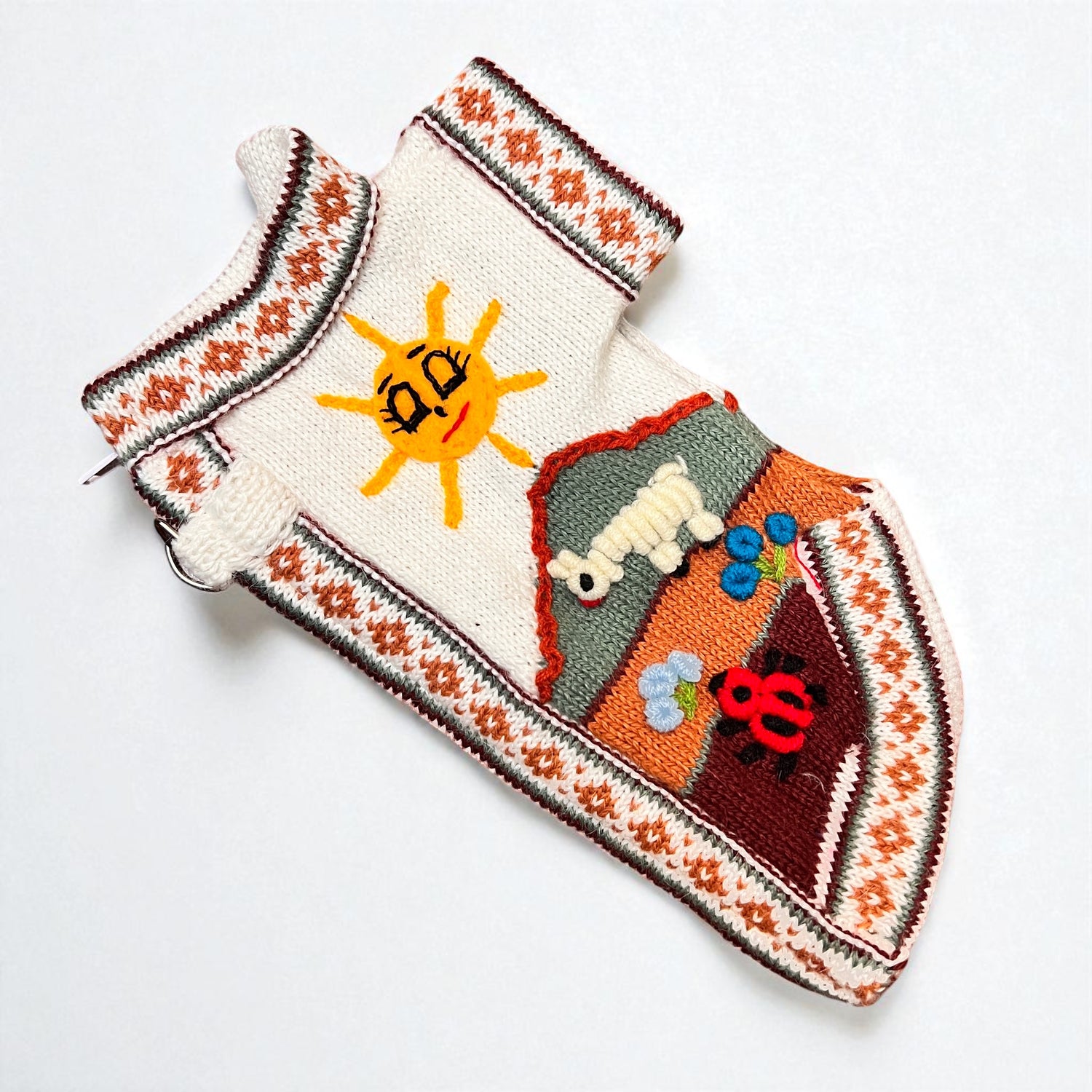 hand embroidered royal bone color dog sweater, handmade in the andes of Peru by Peruvian Accent.