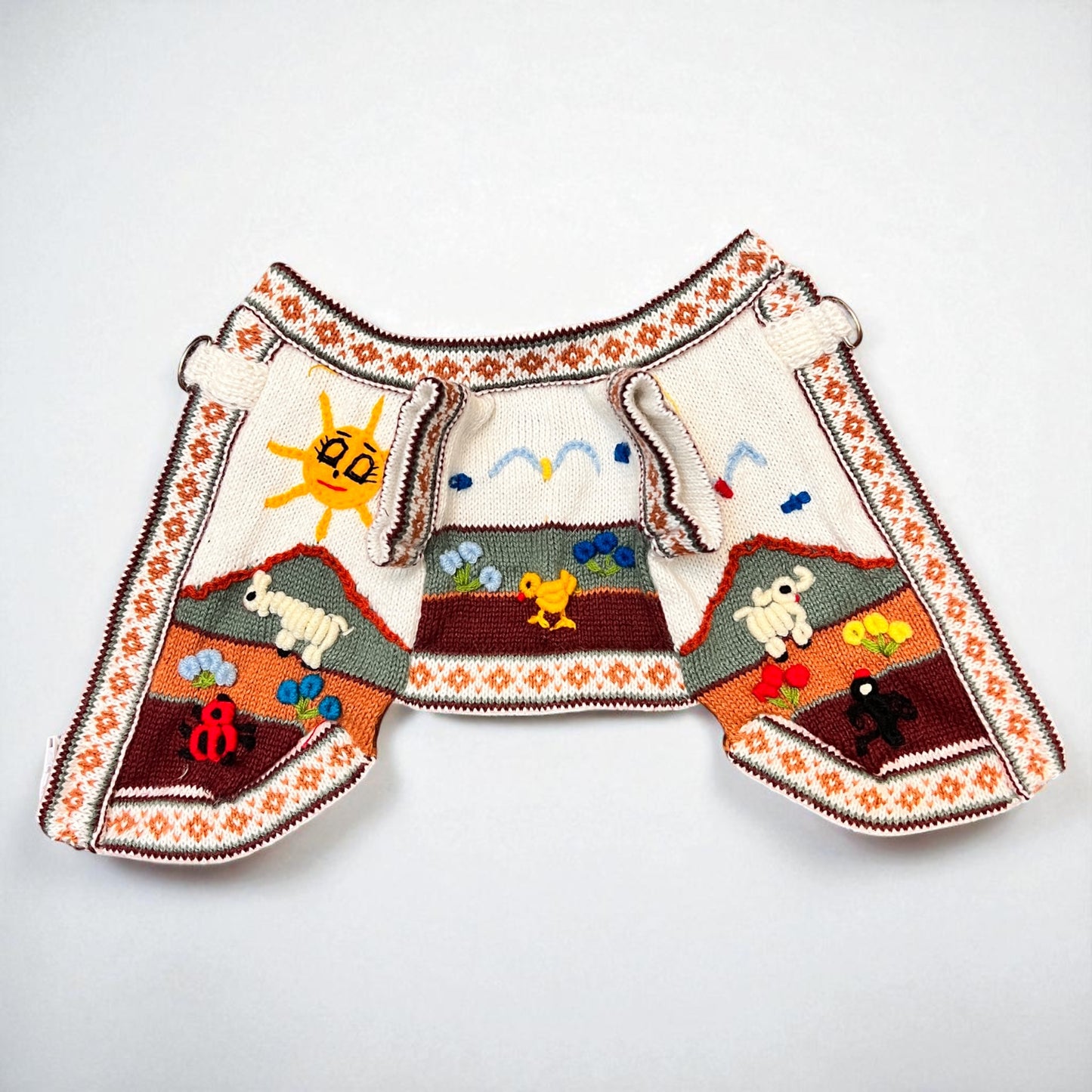 hand embroidered royal bone color dog sweater, handmade in the andes of Peru by Peruvian Accent.