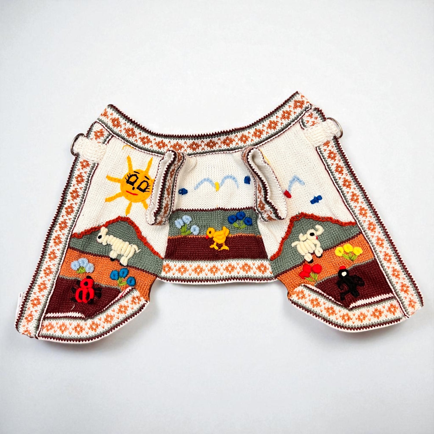 hand embroidered royal bone color dog sweater, handmade in the andes of Peru by Peruvian Accent.