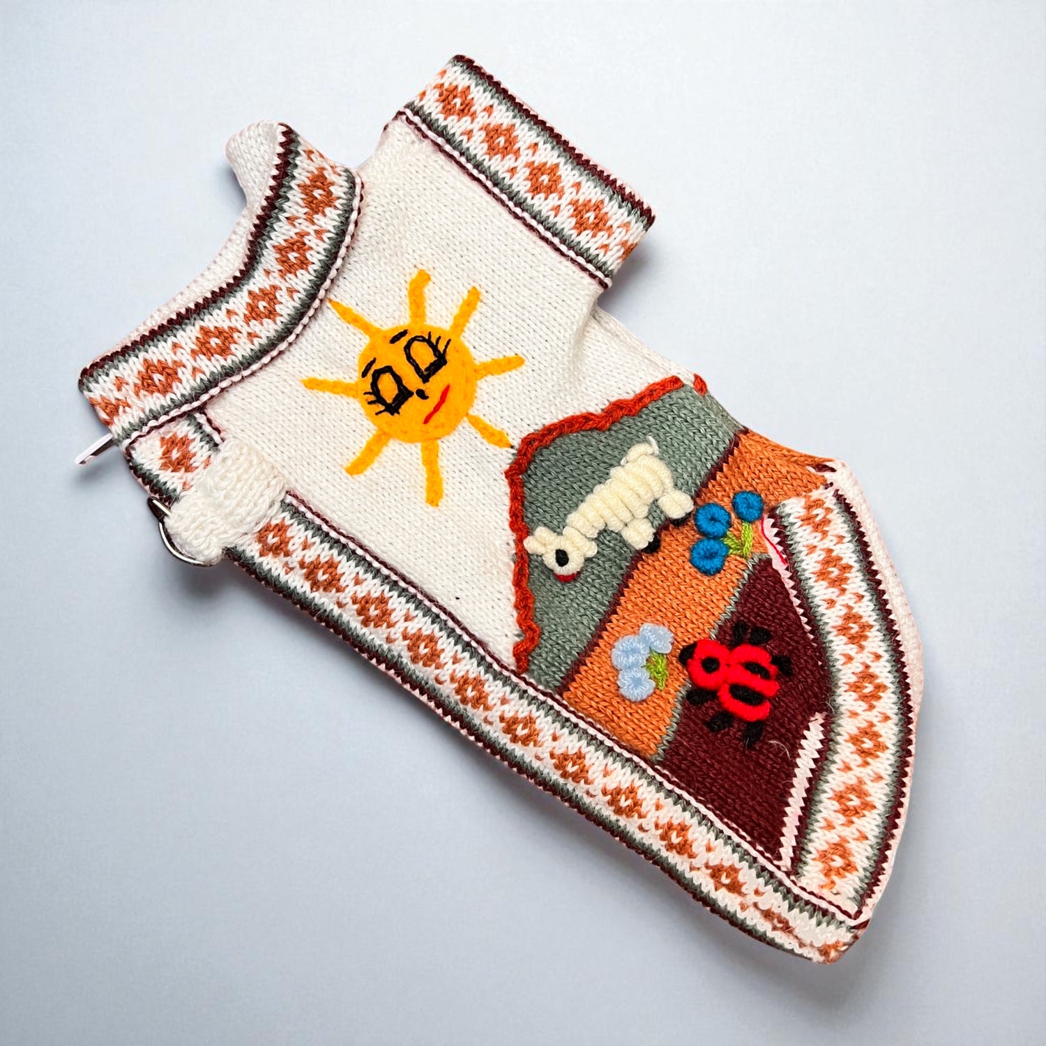hand embroidered royal bone color dog sweater, handmade in the andes of Peru by Peruvian Accent.