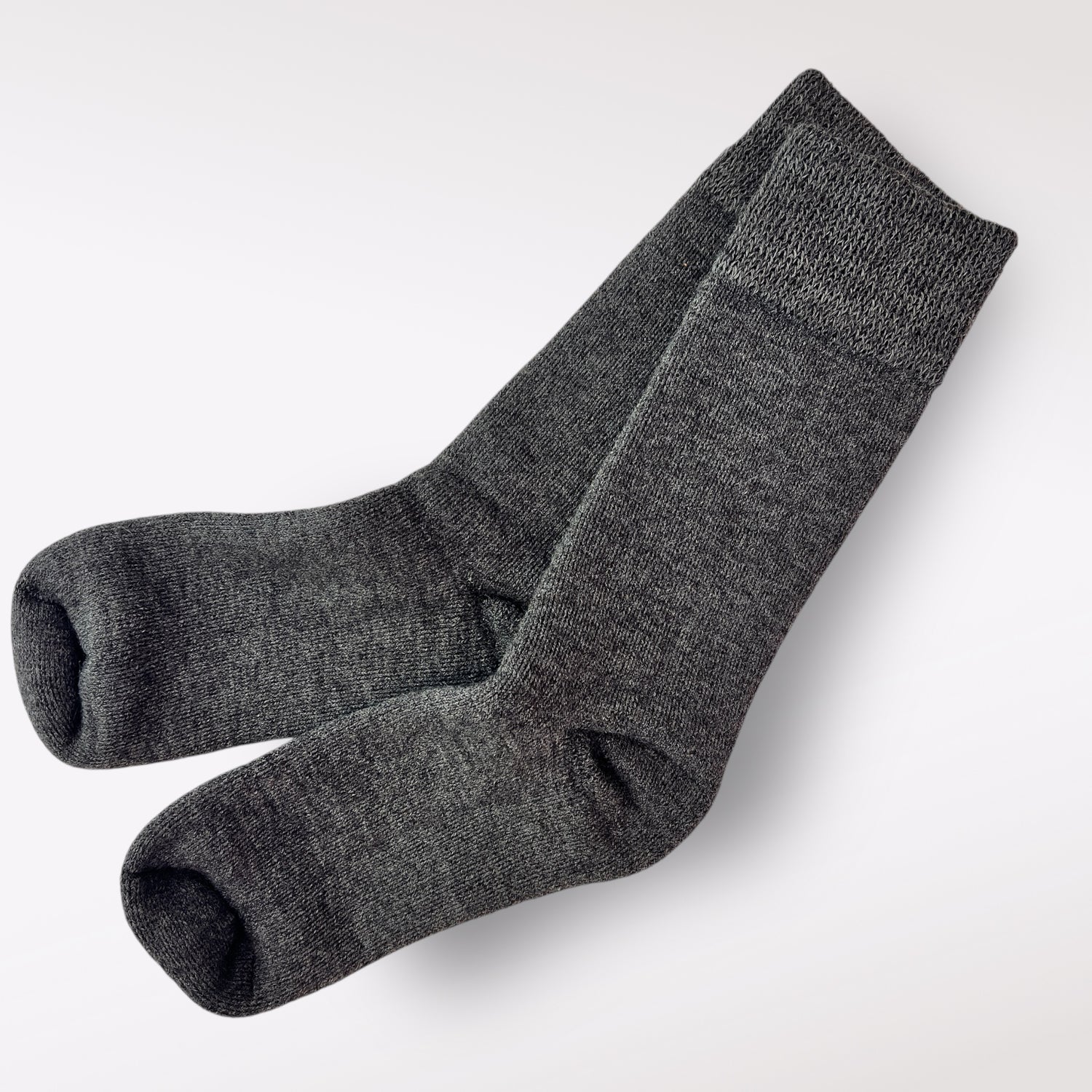 Charcoal color PacaTrek Alpaca socks. Gret for hiking, hunting, work or everyday life. Therapeutic, won't leave a dent in your leg and are moisture wicking. Best of all, they regulate heat. If the sun comes out, your feet will not get too hot.  also don't stink after hiking.