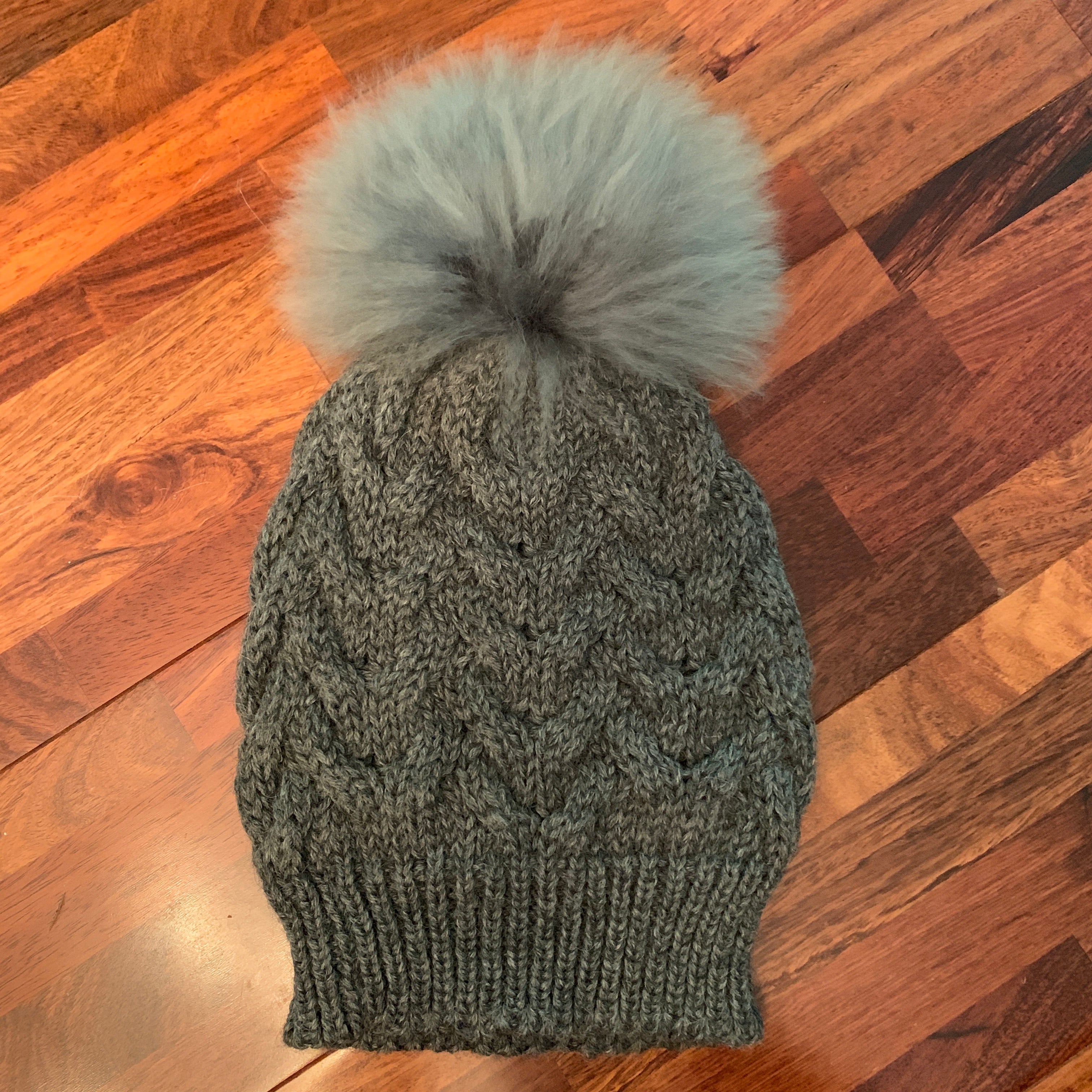 Handmade Alpaca beanie with real fur pompom.