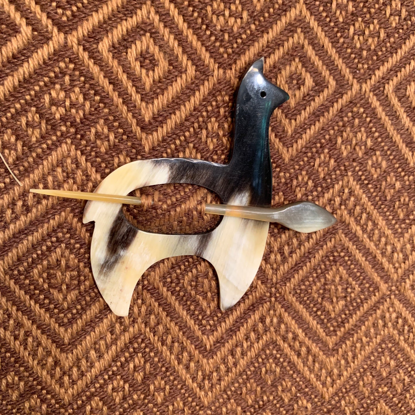 Handmade luxury sweater pins made from bull horns. - Peruvian Accent